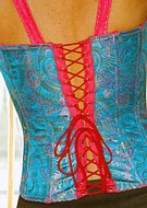 Corset with bright satin inserts